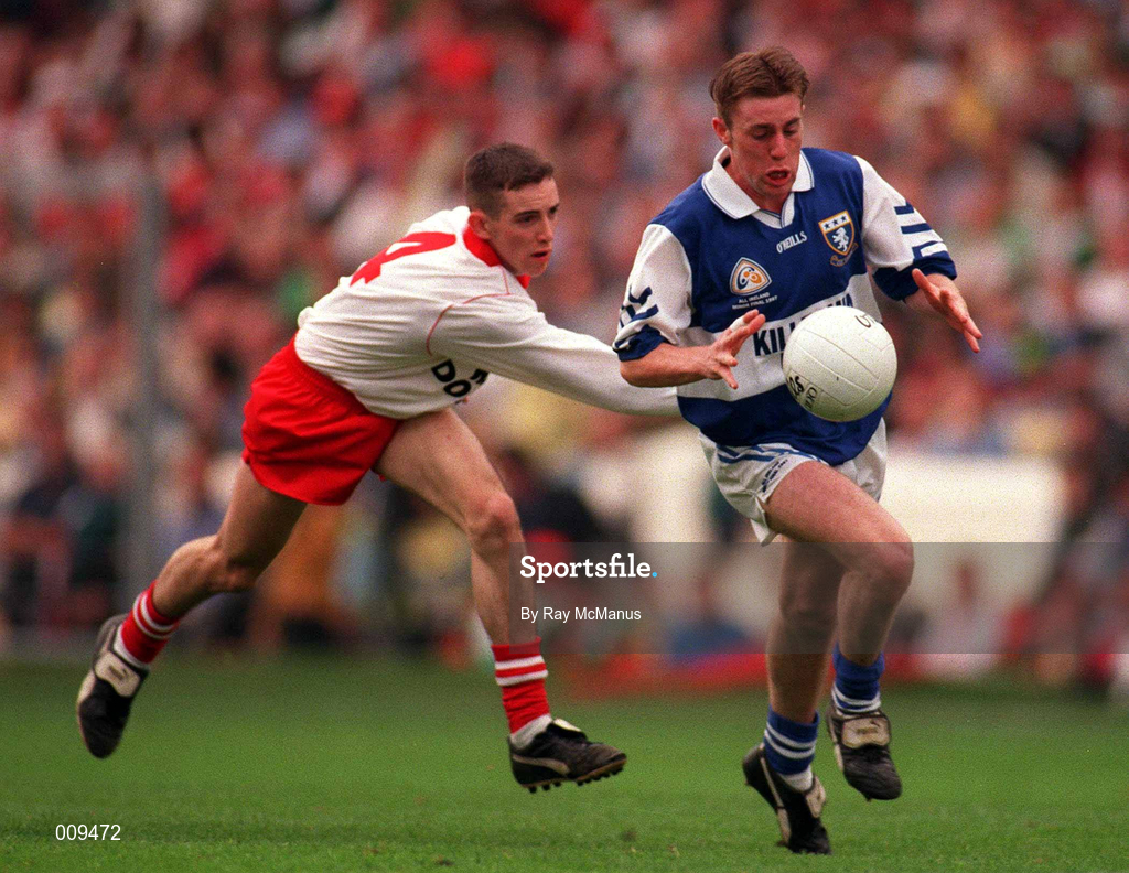 28 September 1998; Kieran Kelly of Laois is tackled by Brendan Donnelly of Tyrone during the All-Ireland Minor Football Championship Final between Laois and Tyrone at Croke Park in Dublin. Photo by Ray McManus/Sportsfile