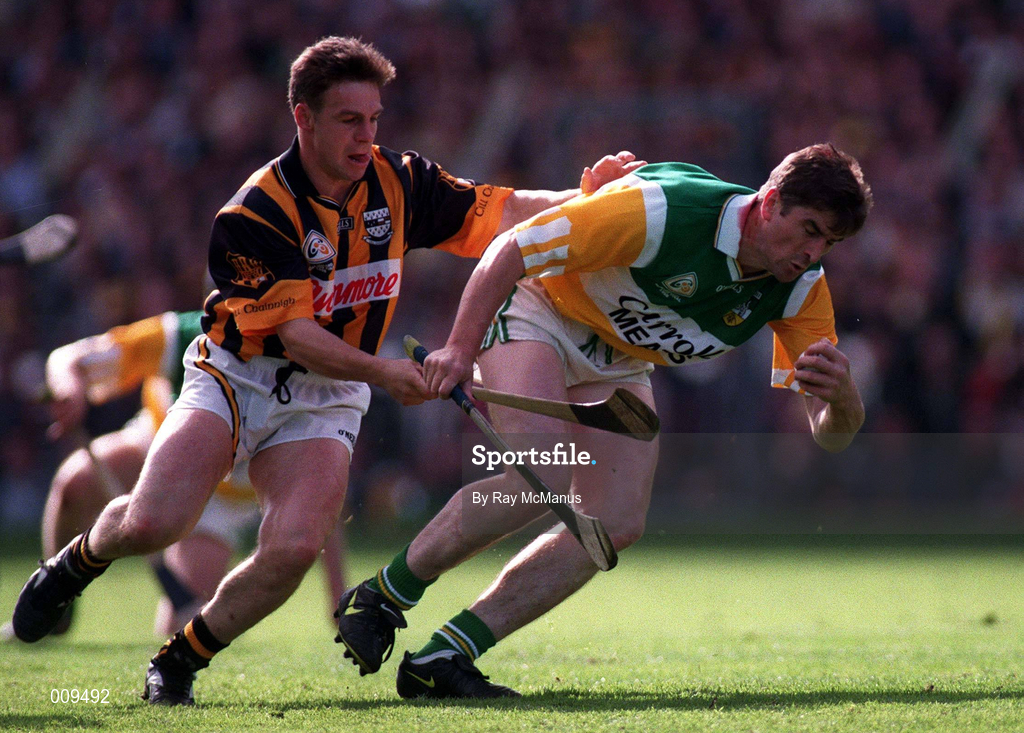 13 September 1998; Michael Duignan of Offaly is tackled by Charlie Carter of Kilkenny during the Guinness All-Ireland Senior Hurling Championship Final match between Kilkenny and Offaly at Croke Park in Dublin. Photo by Ray McManus/Sportsfile