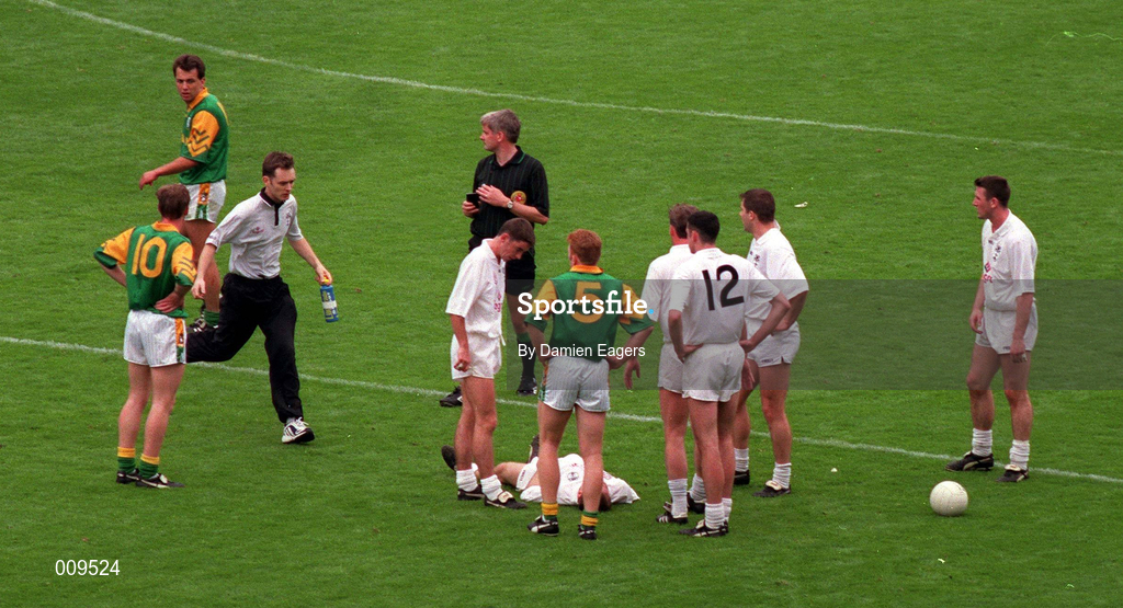 2 August 1998; The Kildare team physio Eamonn Ó Muircheartaigh comes on to attend to Declan Kerrigan during the Bank of Ireland Leinster Senior Football Championship Final match between Kildare and Meath at Croke Park in Dublin. Photo by Damien Eagers/Sportsfile