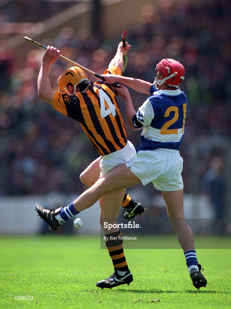 14 June 1998; Fionan O'Sullivan of Laois in action against Liam Keoghan of Kilkenny during the Guinness Leinster Senior Hurling Championship Semi-Final match between Kilkenny and Laois at Croke Park in Dublin. Photo by Ray McManus/Sportsfile
