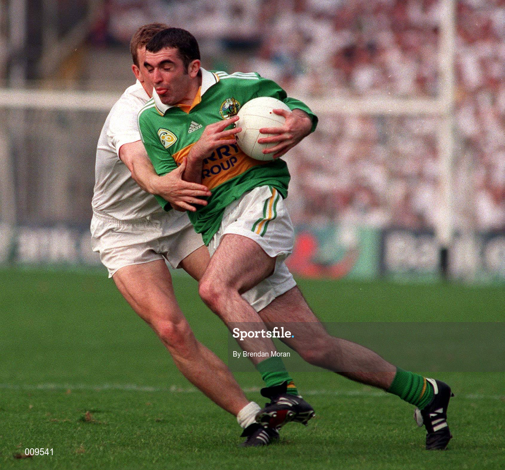 30 August 1998; Liam Brosnan of Kerry is tackled by John Finn of Kildare during the Bank of Ireland All-Ireland Senior Football Championship Semi-Final match between Kerry and Kildare at Croke Park in Dublin. Photo by Brendan Moran/Sportsfile