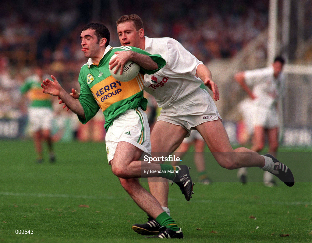 30 August 1998; Liam Brosnan of Kerry is tackled by John Finn of Kildare during the Bank of Ireland All-Ireland Senior Football Championship Semi-Final match between Kerry and Kildare at Croke Park in Dublin. Photo by Brendan Moran/Sportsfile