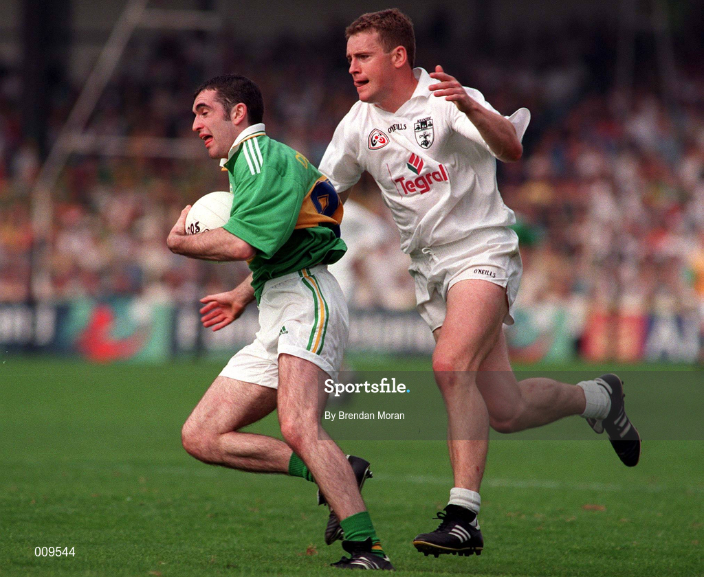 30 August 1998; Liam Brosnan of Kerry is tackled by John Finn of Kildare during the Bank of Ireland All-Ireland Senior Football Championship Semi-Final match between Kerry and Kildare at Croke Park in Dublin. Photo by Brendan Moran/Sportsfile