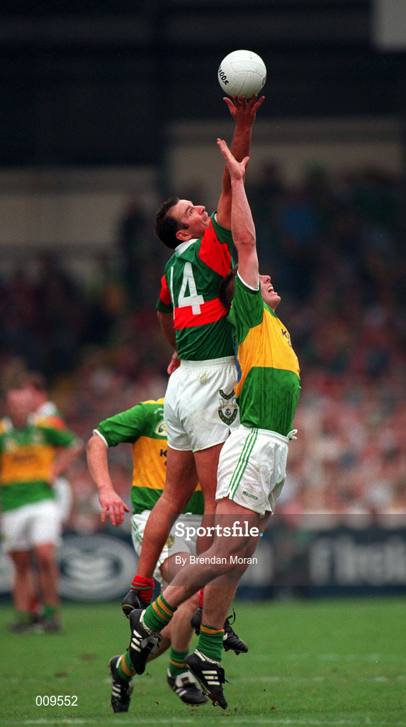 28 September 1997; Liam McHale of Mayo beats Darragh Ó Sé of Kerry to the ball during the Bank of Ireland All-Ireland Senior Football Championship Final between Kerry and Mayo at Croke Park in Dublin. Photo by Brendan Moran/Sportsfile