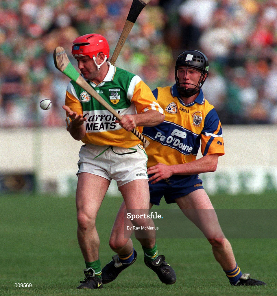29 August 1998; Martin Hanamy of Offaly in action against Niall Gilligan of Clare during the Guinness All-Ireland Senior Hurling Championship Semi-Final Refixture match between Clare and Offaly at Semple Stadium in Thurles, Tipperary. Photo by Ray McManus/Sportsfile