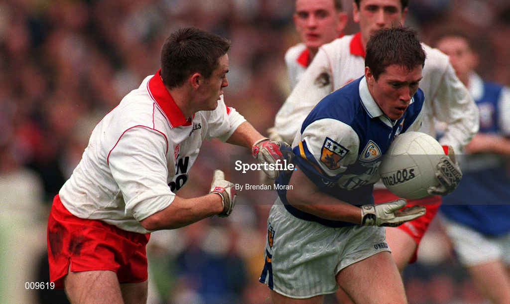 27 September 1998; Michael Clancy of Laois in action against Michael McGee of Tyrone during the All-Ireland Minor Football Championship Final between Laois and Tyrone at Croke Park in Dublin. Photo by Brendan Moran/Sportsfile
