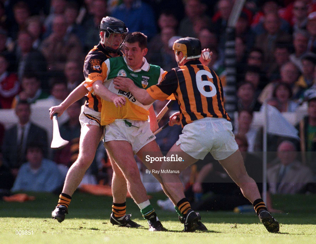 13 September 1998; Paudie Mulhare of Offaly is tackled by Michael Kavanagh, left, and Canice Brennan of Kilkenny during the Guinness All-Ireland Senior Hurling Championship Final match between Kilkenny and Offaly at Croke Park in Dublin. Photo by Ray McManus/Sportsfile