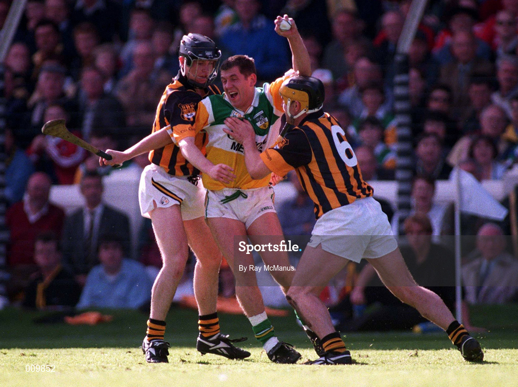 13 September 1998; Paudie Mulhare of Offaly is tackled by Kilkenny players Michael Kavanagh and Canice Brennan, right, during the Guinness All-Ireland Senior Hurling Championship Final match between Kilkenny and Offaly at Croke Park in Dublin. Photo by Ray McManus/Sportsfile