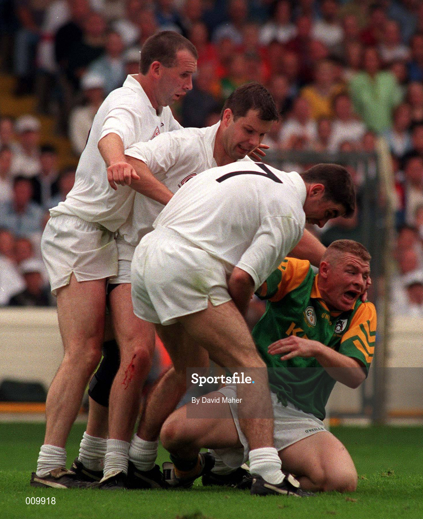 2 August 1998; Tommy Dowd, Meath, in a tussle with Kildare players from left, Glenn Ryan, Ronan Quinn and Anthony Rainbow during the Bank of Ireland Leinster Senior Football Championship Final match between Kildare and Meath at Croke Park in Dublin. Photo by David Maher/Sportsfile
