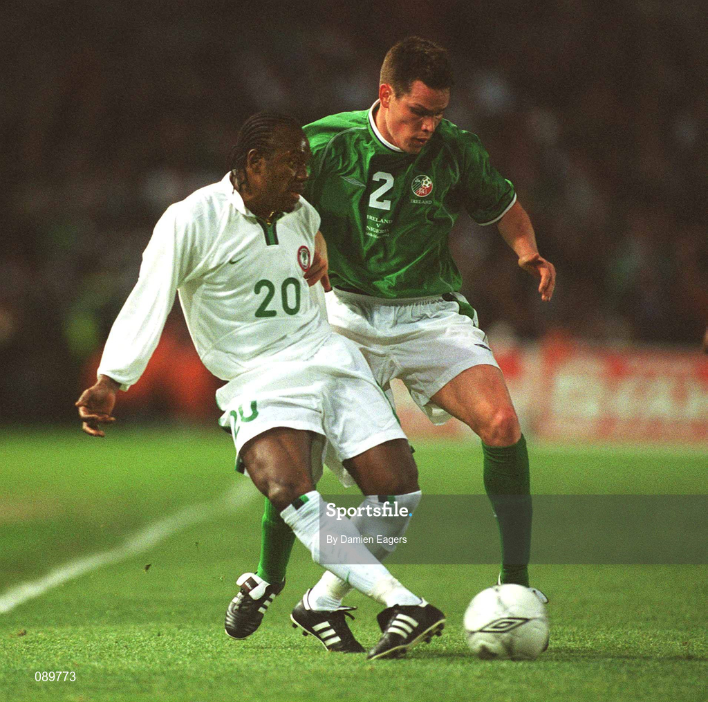 16 May 2002; Wilson Oruma of Nigeria in action against the Republic of Ireland's Steve Finnan during the International Friendly match between Republic of Ireland and Nigeria at Lansdowne Road in Dublin. Photo by Damien Eagers/Sportsfile
