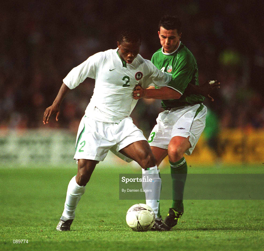 16 May 2002; Joseph Yobo of Nigeria in action against the Republic of Ireland's Ian Harte during the International Friendly match between Republic of Ireland and Nigeria at Lansdowne Road in Dublin. Photo by Damien Eagers/Sportsfile