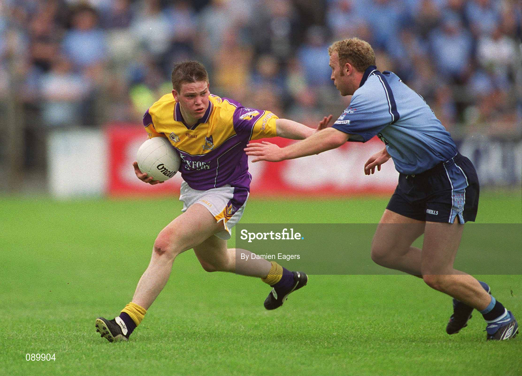 1 June 2002; David Murphy of Wexford is tackled by Dublin's Shane Ryan during the Bank of Ireland Leinster Senior Football Championship Quarter-Final match between Wexford and Dublin at Dr. Cullen Park in Carlow. Photo by Damien Eagers/Sportsfile