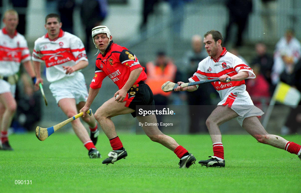 25 May 2002; Noel Sands of Down in action against Colin Eldowney of Derry during the Guinness Ulster Senior Hurling Championship Semi-Final match between Down and Derry at Casement Park in Belfast. Photo by Damien Eagers/Sportsfile