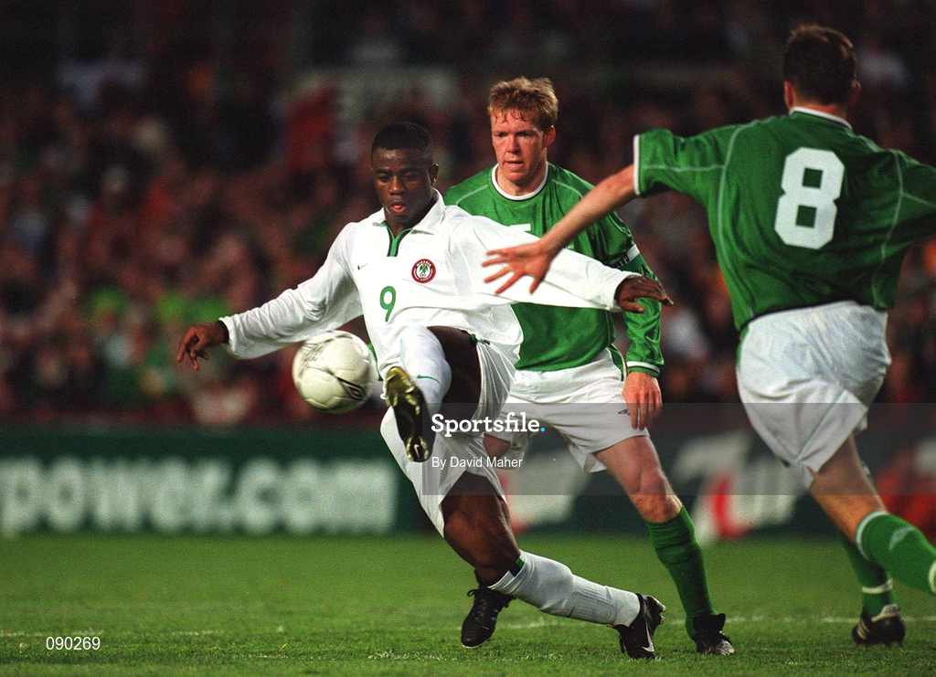 16 May 2002; Bartholomew Ogbeche of Nigeria in action against the Republic of Ireland's Steve Staunton, left, and Mark Kinsella during the International Friendly match between Republic of Ireland and Nigeria at Lansdowne Road in Dublin. Photo by David Maher/Sportsfile