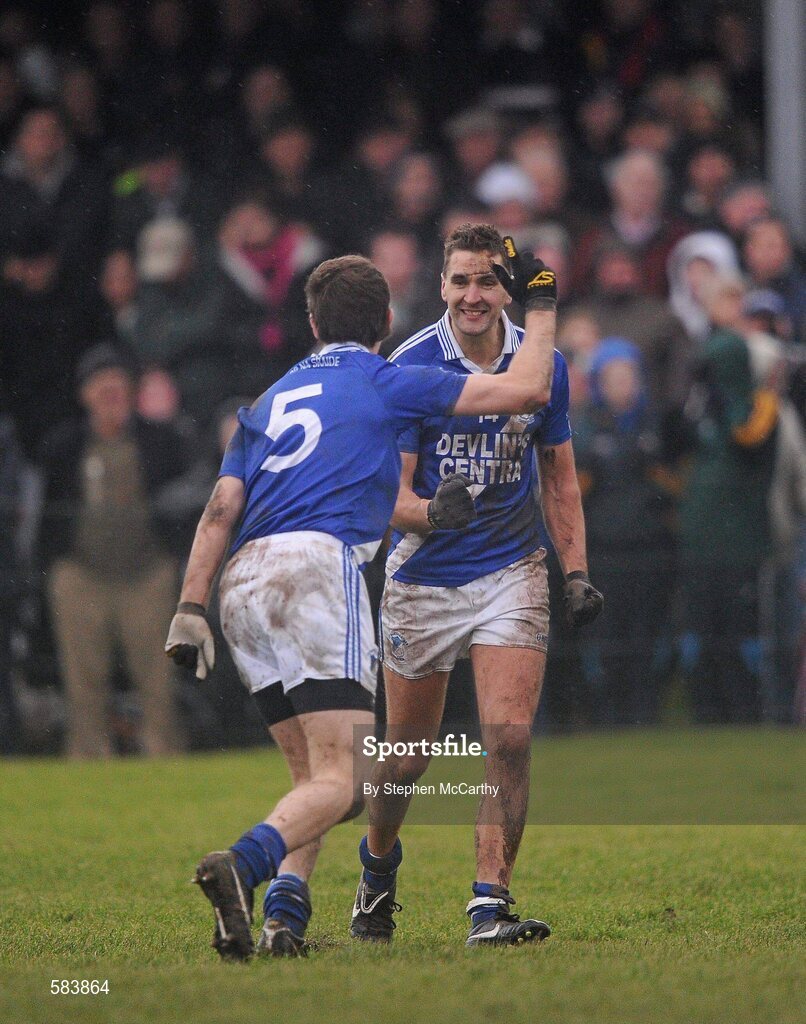 24 December 2011; St. Mary's players Maurice Fitzgerald, right, and Niall O'Driscoll celebrate their side's victory. South Kerry Senior Football Championship Final, St. Mary's v Dromid Pearses, Waterville Sportsfield, Waterville, Co. Kerry. Picture credit: Stephen McCarthy / SPORTSFILE
