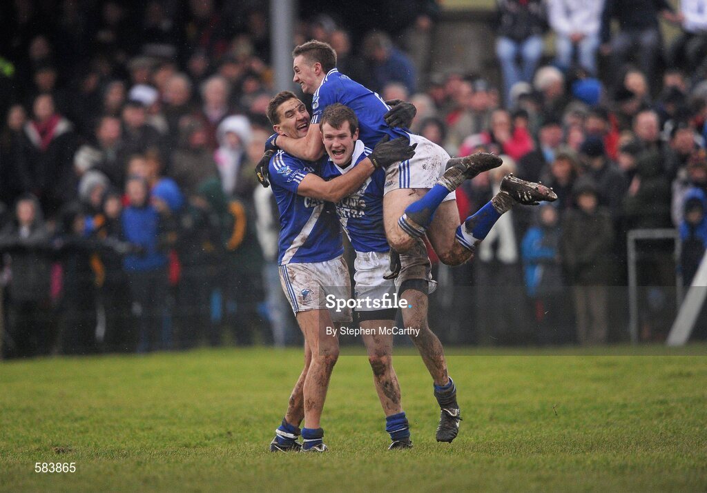 24 December 2011; St. Mary's players, from left, Maurice Fitzgerald, Niall O'Driscoll and Paul O'Donoghue, on top, celebrate their side's victory. South Kerry Senior Football Championship Final, St. Mary's v Dromid Pearses, Waterville Sportsfield, Waterville, Co. Kerry. Picture credit: Stephen McCarthy / SPORTSFILE