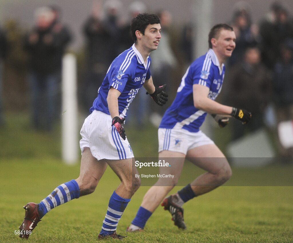 24 December 2011; Sean Cournane, St. Mary's, left, celebrates after scoring his side's second goal, alongside team-mate Denis Daly. South Kerry Senior Football Championship Final, St. Mary's v Dromid Pearses, Waterville Sportsfield, Waterville, Co. Kerry. Picture credit: Stephen McCarthy / SPORTSFILE