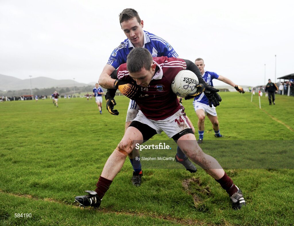 24 December 2011; Niall O Se, Dromid Pearses, in action against Brian Curran, St. Mary's. South Kerry Senior Football Championship Final, St. Mary's v Dromid Pearses, Waterville Sportsfield, Waterville, Co. Kerry. Picture credit: Stephen McCarthy / SPORTSFILE
