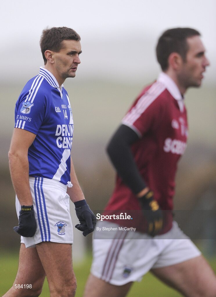 24 December 2011; Maurice Fitzgerald, St. Mary's, and Declan O'Sullivan, Dromid Pearses, right, during the pre-match parade. South Kerry Senior Football Championship Final, St. Mary's v Dromid Pearses, Waterville Sportsfield, Waterville, Co. Kerry. Picture credit: Stephen McCarthy / SPORTSFILE