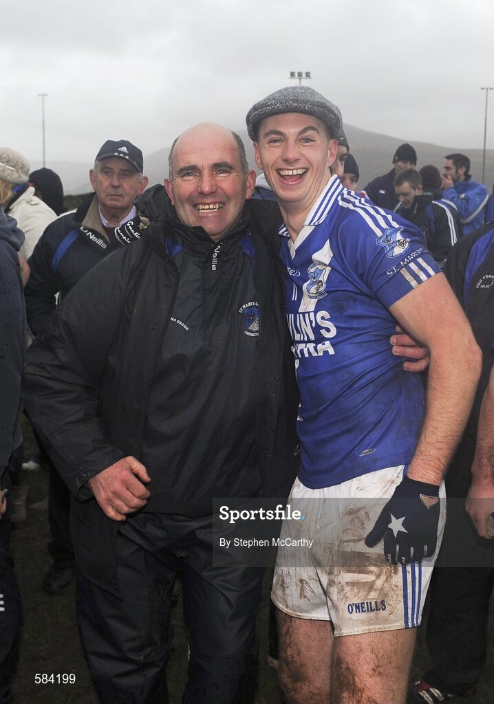 24 December 2011; St. Mary's Paul O'Donoghue celebrates with Denis Daly. South Kerry Senior Football Championship Final, St. Mary's v Dromid Pearses, Waterville Sportsfield, Waterville, Co. Kerry. Picture credit: Stephen McCarthy / SPORTSFILE