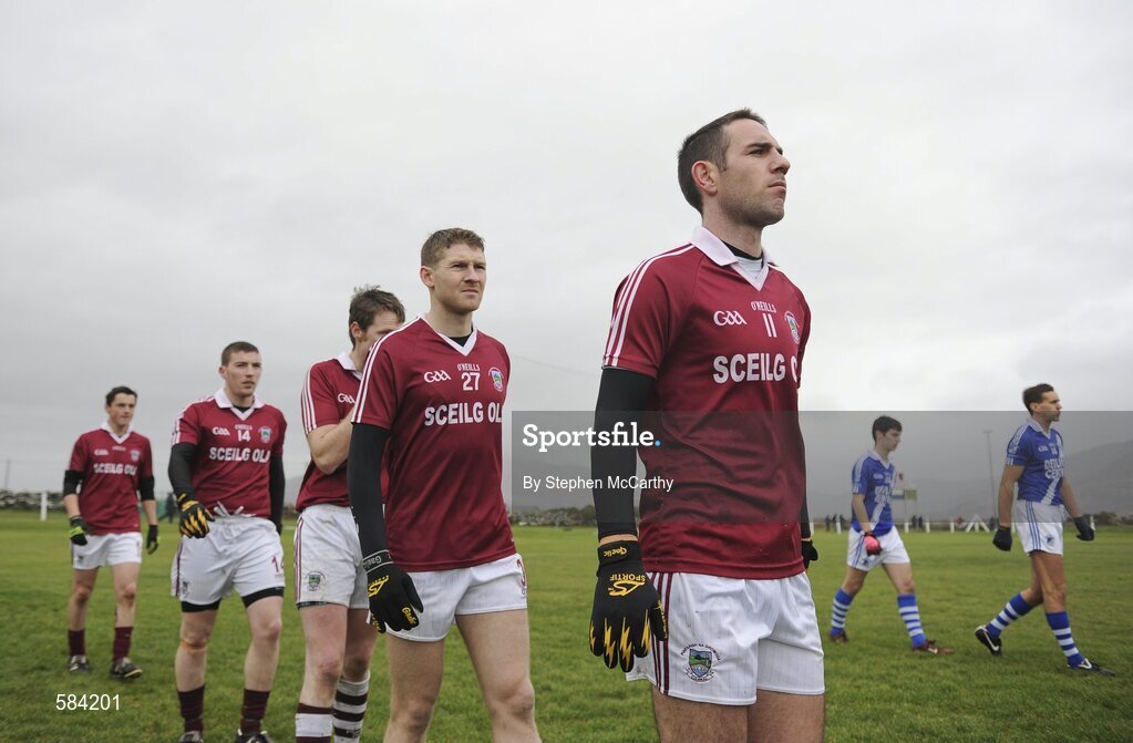 24 December 2011; Declan O'Sullivan, Dromid Pearses, and Maurice Fitzgerald, St. Mary's, right, during the pre-match parade. South Kerry Senior Football Championship Final, St. Mary's v Dromid Pearses, Waterville Sportsfield, Waterville, Co. Kerry. Picture credit: Stephen McCarthy / SPORTSFILE