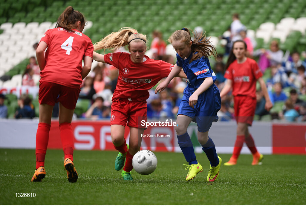 31 May 2017; Ella Moriarty of Our Lady of Good Counsel GNS, Co Dublin, in action against Jennifer Sheehy of Scoil Niocláis, Co Cork, during the SPAR FAI Primary School 5s National Finals at Aviva Stadium, in Lansdowne Rd, Dublin 4. Photo by Sam Barnes/Sportsfile