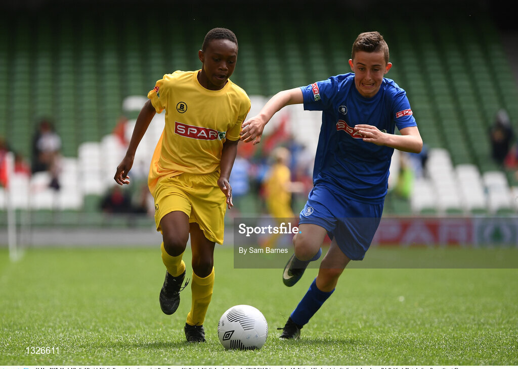 31 May 2017; Mark Mbuli of Dooish NS, Co Donegal, in action against Ryan Doran of St Peter's NS, Co Louth, during the SPAR FAI Primary School 5s National Finals at Aviva Stadium, in Lansdowne Rd, Dublin 4. Photo by Sam Barnes/Sportsfile