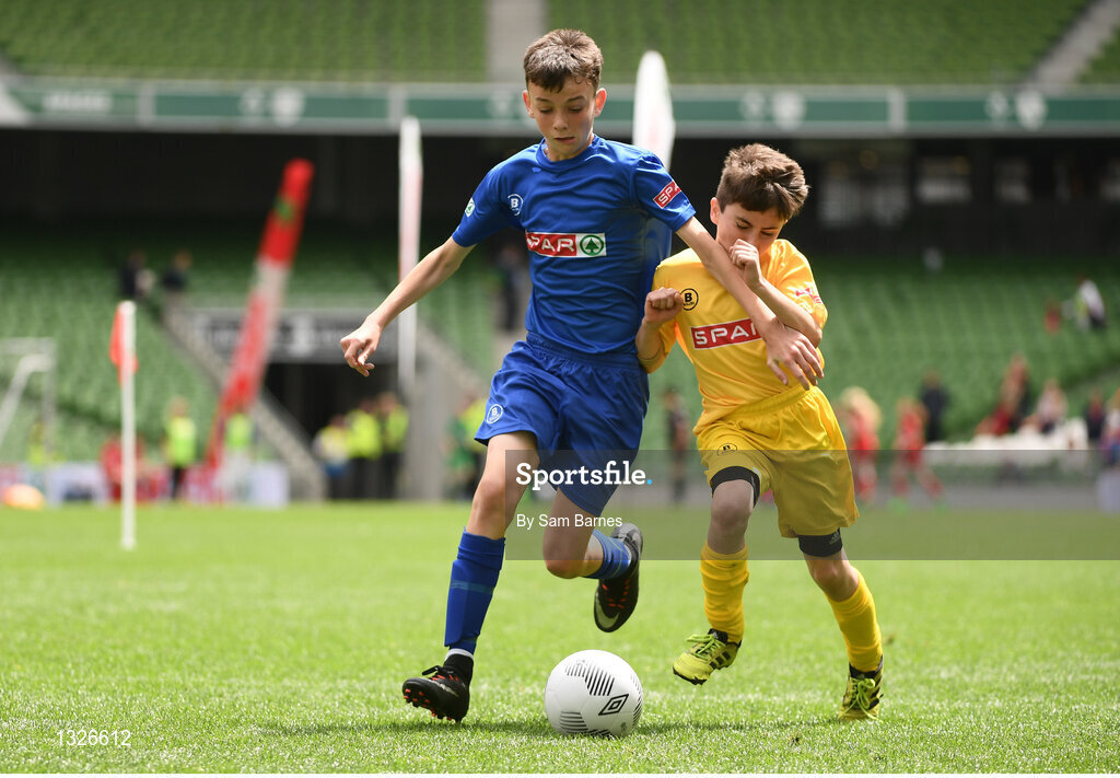 31 May 2017; Rían McConnell of St Patrick's NS, Co Meath, in action against Aaron Kennedy of Scoil Bhríde, Co Monaghan, during the SPAR FAI Primary School 5s National Finals at Aviva Stadium, in Lansdowne Rd, Dublin 4. Photo by Sam Barnes/Sportsfile