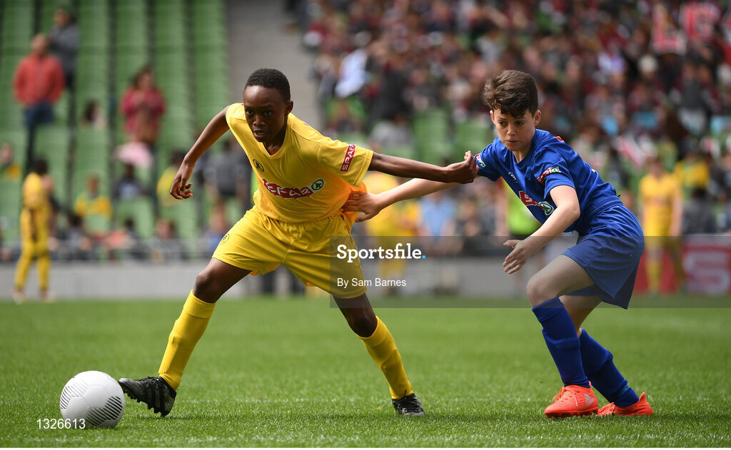 31 May 2017; Mark Mbuli of Dooish NS, Co Donegal, in action against James Woods of St Peter's NS, Co Louth, during the SPAR FAI Primary School 5s National Finals at Aviva Stadium, in Lansdowne Rd, Dublin 4. Photo by Sam Barnes/Sportsfile