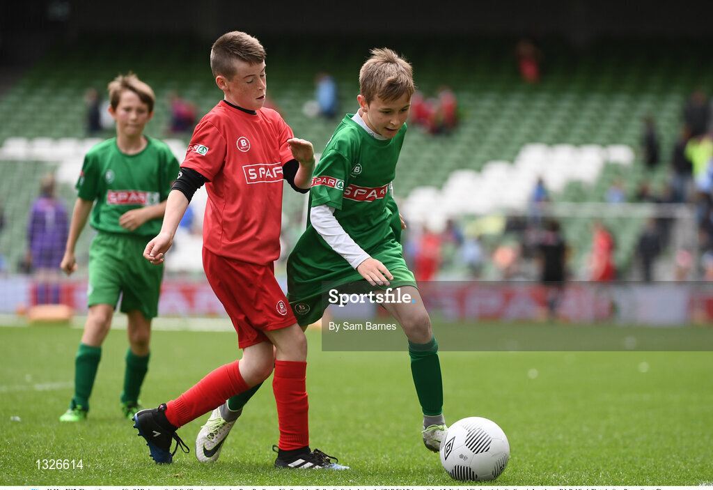 31 May 2017; Thomas Sweeney of Scoil Mhuire gan Smál, Co Sligo, in action against Ryan Bradburn of Scoil an Athar Tadhg, Co Cork,  during the SPAR FAI Primary School 5s National Finals at Aviva Stadium, in Lansdowne Rd, Dublin 4. Photo by Sam Barnes/Sportsfile