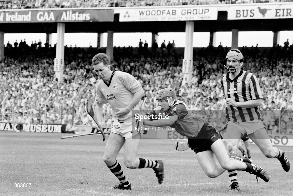 21 July 1991; Kilkenny goalkeeper Michael Walsh, supported by team-mate John Henderson, clears under pressure from Brian McMahon, Dublin. Leinster Senior Hurling Championship Final, Dublin v Kilkenny, Croke Park, Dublin. Picture credit; Connolly Collection / SPORTSFILE