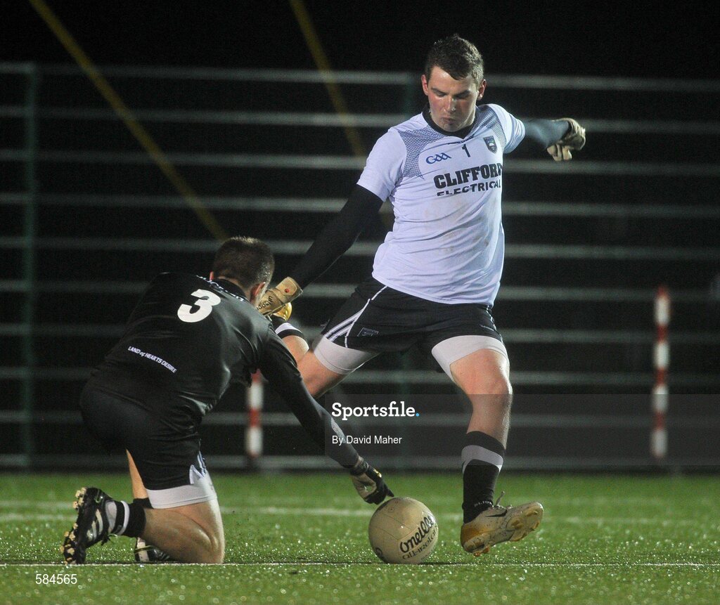 4 January 2012; David Rooney, Sligo, keeps the ball steady in the windy conditions as goalkeeper Vinny Cadden takes a kick out during the game. FBD Insurance League, Section A, Round 1, Sligo v NUIG, Connacht GAA Centre of Excellence, Ballyhaunis, Co. Mayo. Picture credit: David Maher / SPORTSFILE