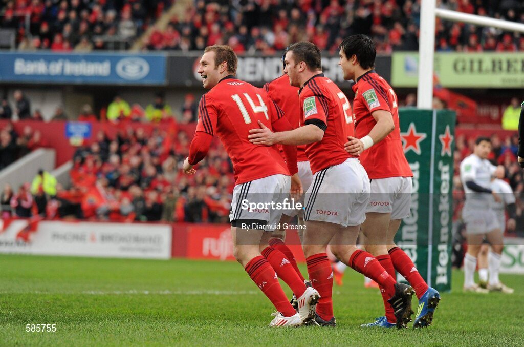 14 January 2012; Johne Murphy, Munster, celebrates with team-mates Damien Varley, and Conor Murray after scoring his side's first try. Heineken Cup, Pool 1, Round 5, Munster v Castres Olympique, Thomond Park, Limerick. Picture credit: Diarmuid Greene / SPORTSFILE
