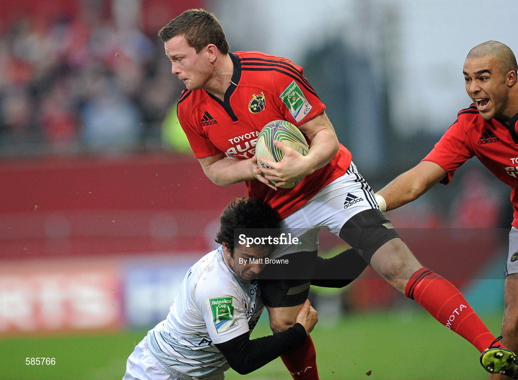14 January 2012; Denis Hurley, Munster, is tackled by Vincent Inigo, Castres Olympique. Heineken Cup, Pool 1, Round 5, Munster v Castres Olympique, Thomond Park, Limerick. Picture credit: Matt Browne / SPORTSFILE