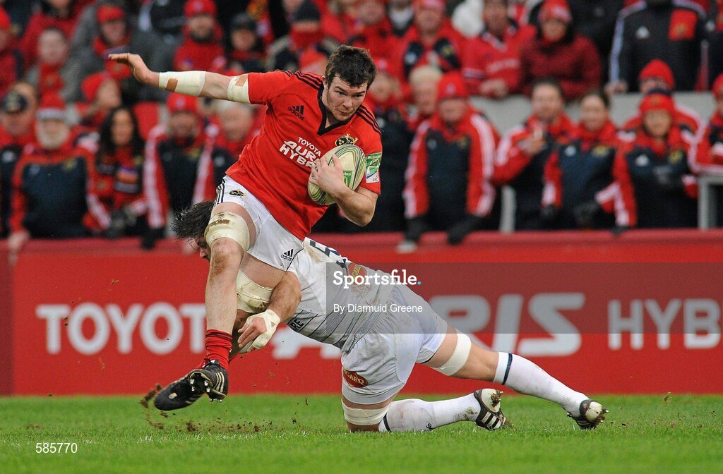 14 January 2012; Peter O'Mahony, Munster, is tackled by Rodrigo Capo Ortega, Castres Olympique. Heineken Cup, Pool 1, Round 5, Munster v Castres Olympique, Thomond Park, Limerick. Picture credit: Diarmuid Greene / SPORTSFILE