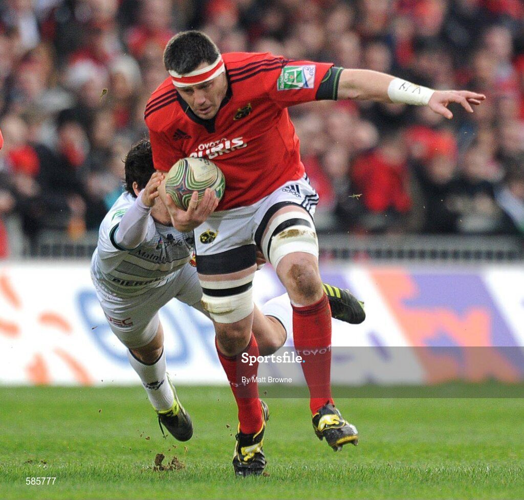 14 January 2012; James Coughlan, Munster, is tackled by Pierre Bernard, Castres Olympique. Heineken Cup, Pool 1, Round 5, Munster v Castres Olympique, Thomond Park, Limerick. Picture credit: Matt Browne / SPORTSFILE