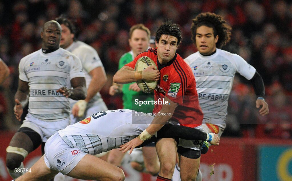 14 January 2012; Conor Murray, Munster, is tackled by Romain Martial, Castres Olympique. Heineken Cup, Pool 1, Round 5, Munster v Castres Olympique, Thomond Park, Limerick. Picture credit: Diarmuid Greene / SPORTSFILE