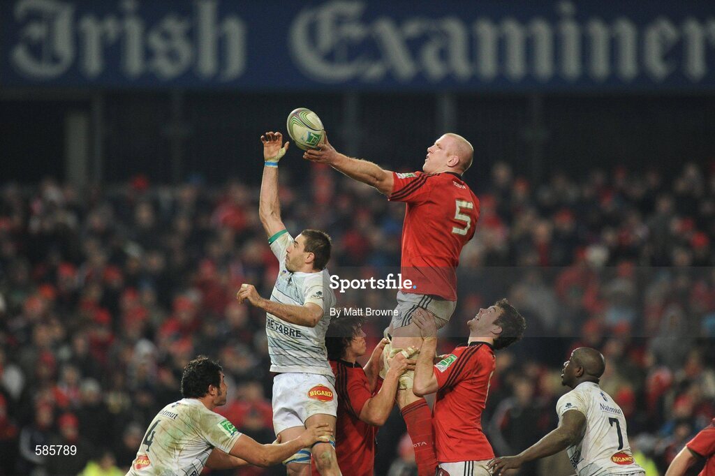 14 January 2012; Paul O'Connell, Munster, wins possession for his side in a lineout ahead of Yannick Caballero, Castres Olympique. Heineken Cup, Pool 1, Round 5, Munster v Castres Olympique, Thomond Park, Limerick. Picture credit: Matt Browne / SPORTSFILE