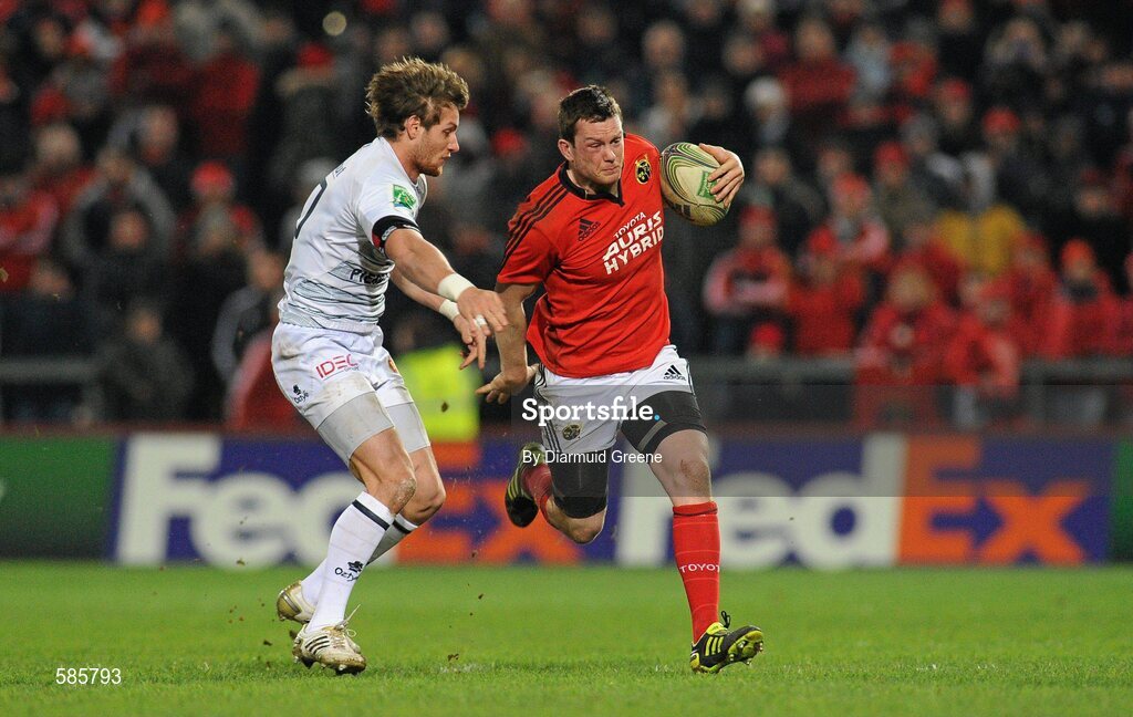 14 January 2012; Denis Hurley, Munster, is tackled by Pierre Roussel, Castres Olympique. Heineken Cup, Pool 1, Round 5, Munster v Castres Olympique, Thomond Park, Limerick. Picture credit: Diarmuid Greene / SPORTSFILE