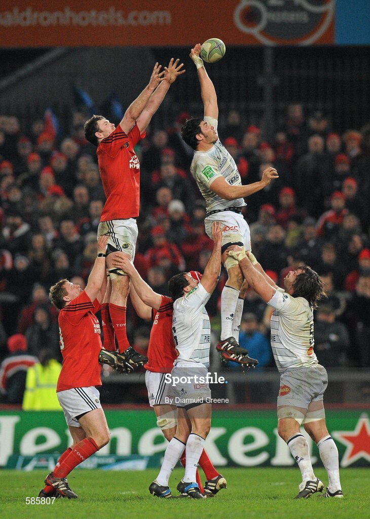 14 January 2012; Matthias Rolland, Castres Olympique, wins possession for his side in the line-out ahead of Donnacha Ryan, Munster. Heineken Cup, Pool 1, Round 5, Munster v Castres Olympique, Thomond Park, Limerick. Picture credit: Diarmuid Greene / SPORTSFILE