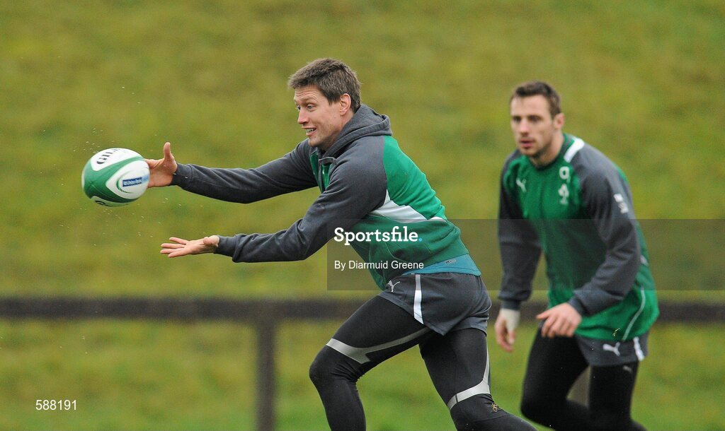 24 January 2012; Ireland's Ronan O'Gara, supported by Tommy Bowe, in action during squad training ahead of their RBS Six Nations Rugby Championship game against Wales on February 5th. Ireland Rugby Squad Training, University of Limerick, Limerick. Picture credit: Diarmuid Greene / SPORTSFILE