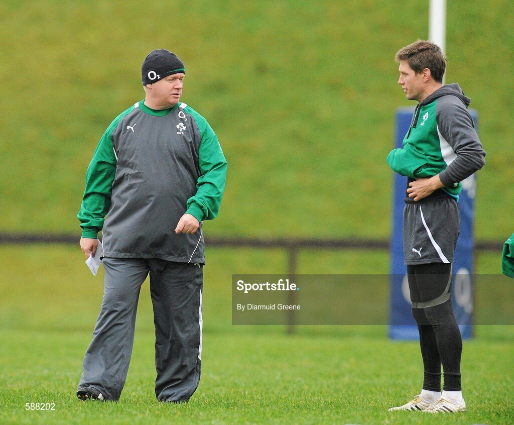 24 January 2012; Ireland head coach Declan Kidney in conversation with Ronan O'Gara during squad training ahead of their RBS Six Nations Rugby Championship game against Wales on February 5th. Ireland Rugby Squad Training, University of Limerick, Limerick. Picture credit: Diarmuid Greene / SPORTSFILE