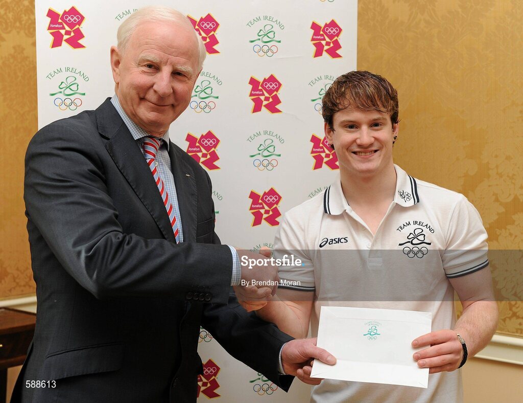 25 January 2012; Ireland's latest Olympic team member, gymnast Kieran Behan, is presented with a cheque for €20,000 by Patrick Hickey, President, Olympic Council of Ireland, to assist in his preparations for the London Olympic Games later this year. The 22 year old, who was told he would never walk again after a childhood illness, has overcome enormous obstacles to be the first Irish gymnast to qualify for the games since 1996. Shelbourne Hotel, Dublin. Picture credit: Brendan Moran / SPORTSFILE