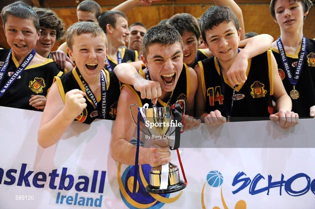 27 January 2012; Christian Brothers College captain Dylan Lenihan, centre, celebrates victory with his team-mates, from left, Daniel Mulcahy, Nick Moore, Ross Murphy, Eoin Barrett, Jack Hartnett and Sam Seymour. All-Ireland Schools Cup U16B Boys Final, Christian Brothers College, Cork v St. Clement's, Limerick, National Basketball Arena, Tallaght, Dublin. Picture credit: Barry Cregg / SPORTSFILE