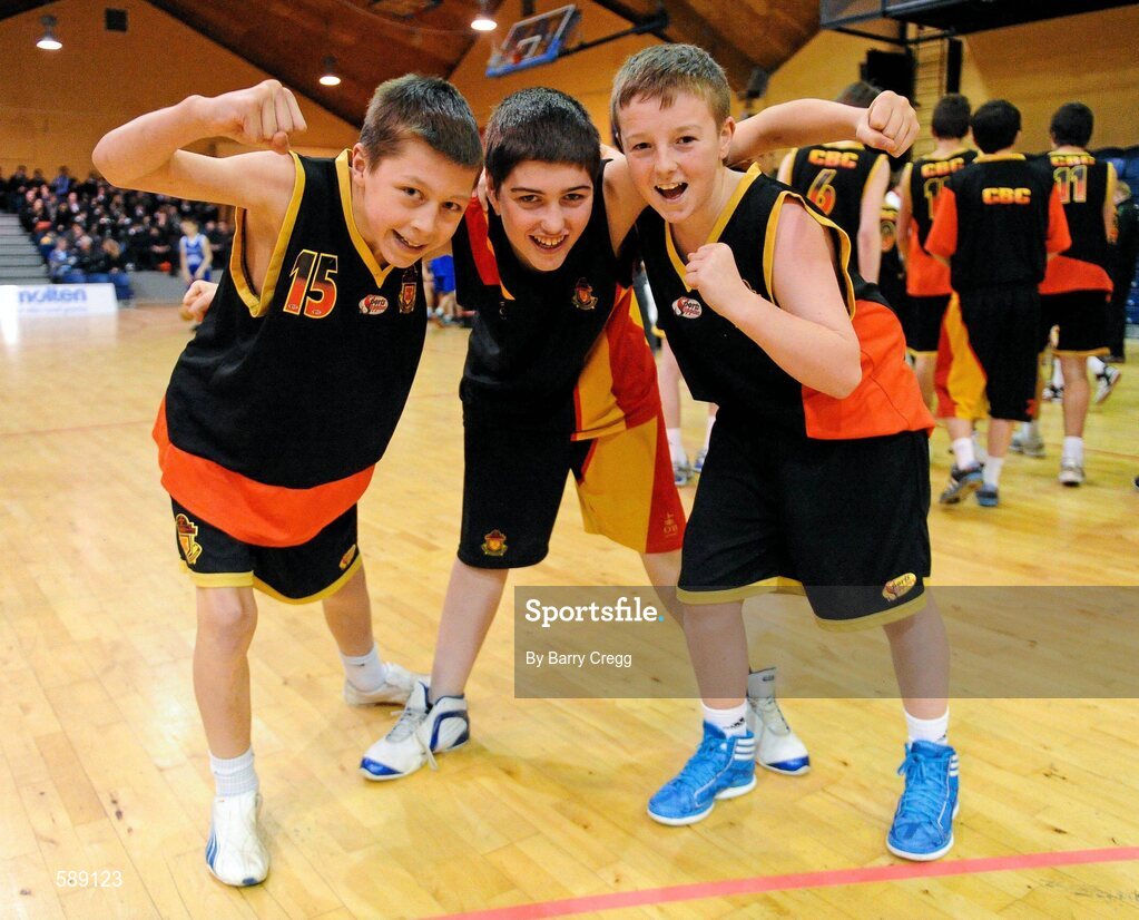 27 January 2012; Christian Brothers College players, from left to right, Daniel Mulcahy, Fionnan McSweeney and Ross Murphy celebrate after the game. All-Ireland Schools Cup U16B Boys Final, Christian Brothers College, Cork v St.Clement's, Limerick, National Basketball Arena, Tallaght, Dublin. Picture credit: Barry Cregg / SPORTSFILE