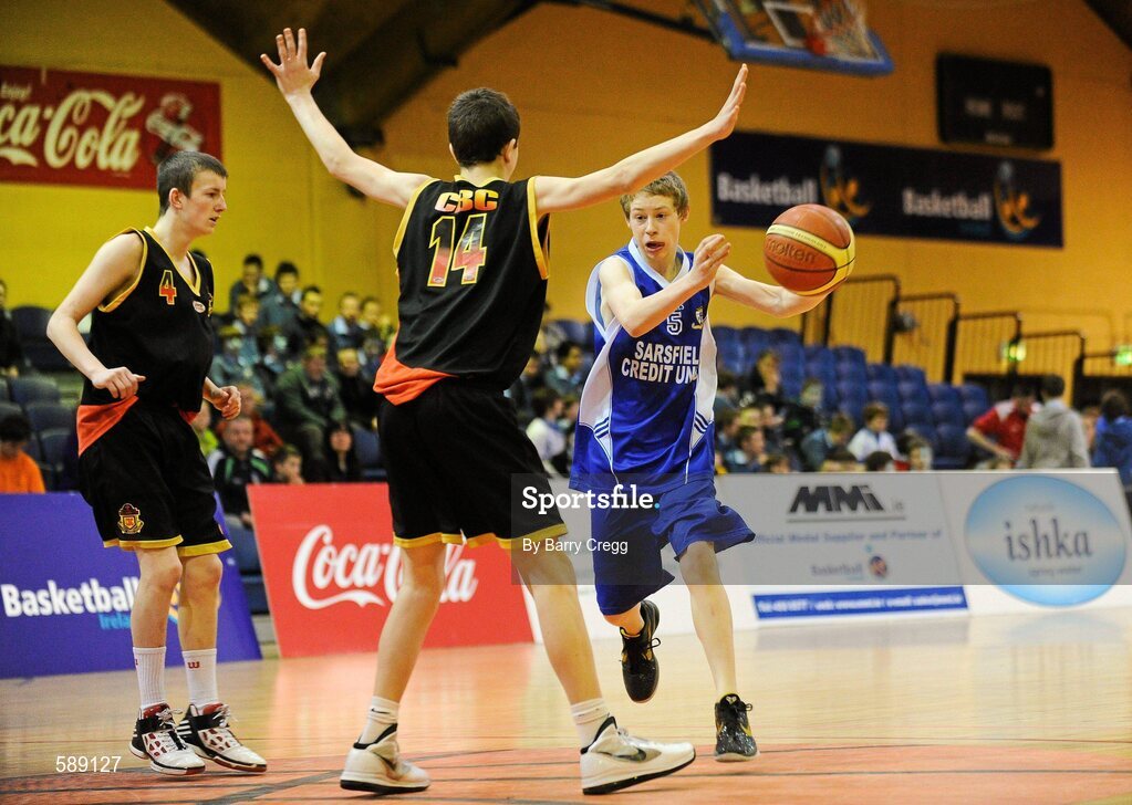 27 January 2012; Evan O'Reilly, St. Clement's, Limerick, in action against Jamie Beadle, left, and Jack Hartnett, right, Christian Brothers College, Cork. All-Ireland Schools Cup U16B Boys Final, Christian Brothers College, Cork v St. Clement's, Limerick, National Basketball Arena, Tallaght, Dublin. Picture credit: Barry Cregg / SPORTSFILE