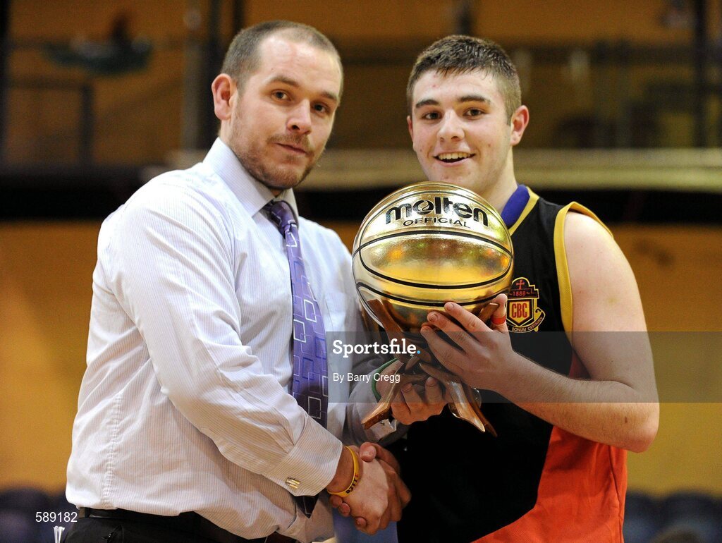 27 January 2012; Receiving the Most Valuable Player award from Senior Competitions Officer of Basketball Ireland Conor Lilly is Christian Brothers College captain Dylan Lenihan. All-Ireland Schools Cup U16B Boys Final, Christian Brothers College, Cork v St. Clement's, Limerick, National Basketball Arena, Tallaght, Dublin. Picture credit: Barry Cregg / SPORTSFILE