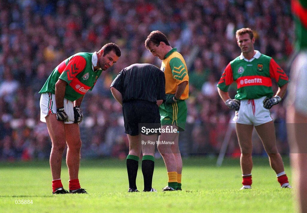 29 September 1996; Referee Pat McEnaney sends off Mayo's Liam McHale and Meath's Colm Coyle after altercations between Meath and Mayo footballers during the Meath v Mayo All-Ireland Football Final replay. Croke Park, Co. Dublin. Picture credit; Ray McManus/SPORTSFILE