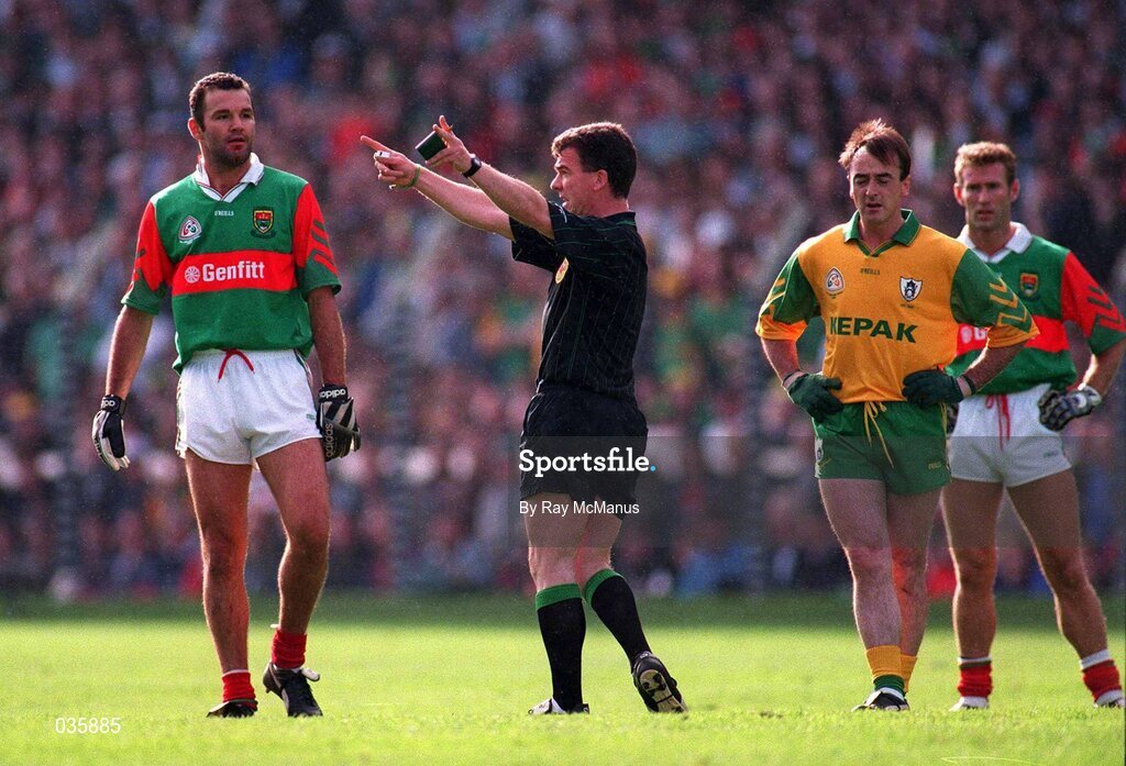 29 September 1996; Referee Pat McEnaney sends off Mayo's Liam McHale and Meath's Colm Coyle after altercations between Meath and Mayo footballers during the Meath v Mayo All-Ireland Football Final replay. Croke Park, Co. Dublin. Picture credit; Ray McManus/SPORTSFILE