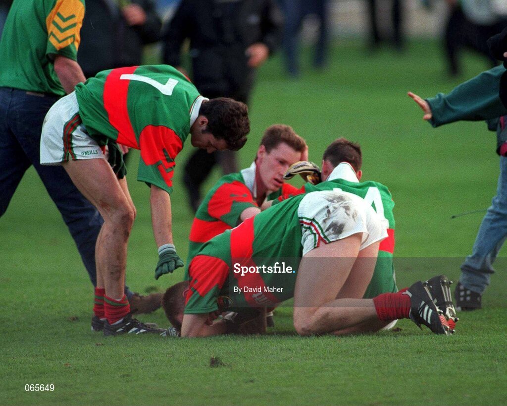 29 September 1996; Mayo players Noel Connelly, 7, David Brady, front, John Casey, 14, and Kevin Cahill, sit dejected after defeat by Meath in the ALL-Ireland Final. Meath v Mayo, Bank of Ireland All-Ireland Football Championship Final, Croke Park, Dublin. Picture credit; David Maher / SPORTSFILE